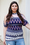 Plus size blue short sleeve cold shoulder top from www.adorastar.com. Features a geometric print, short sleeves, and a tie back.